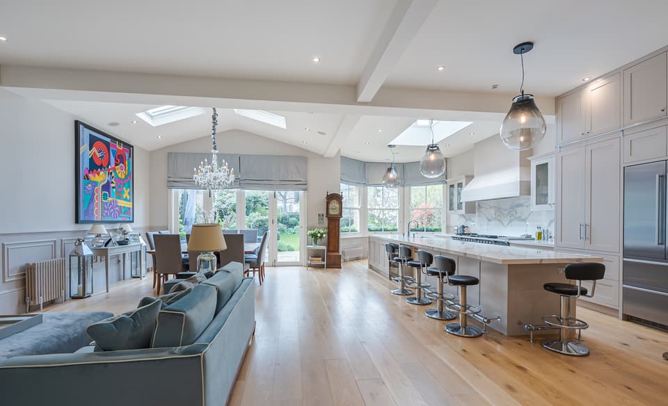 The kitchen and dining space may have a different colour scheme, but the features are all the same